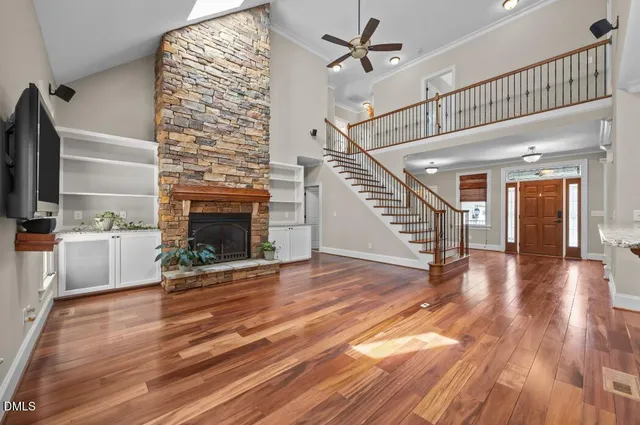a view of an entryway with wooden floor