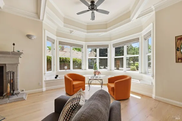 a view of a dining room with furniture and window