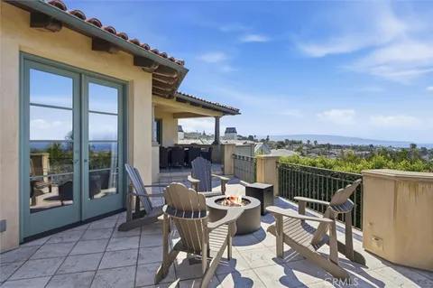 a view of a terrace with furniture