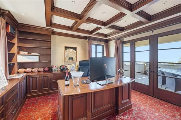 a view of a workspace with furniture