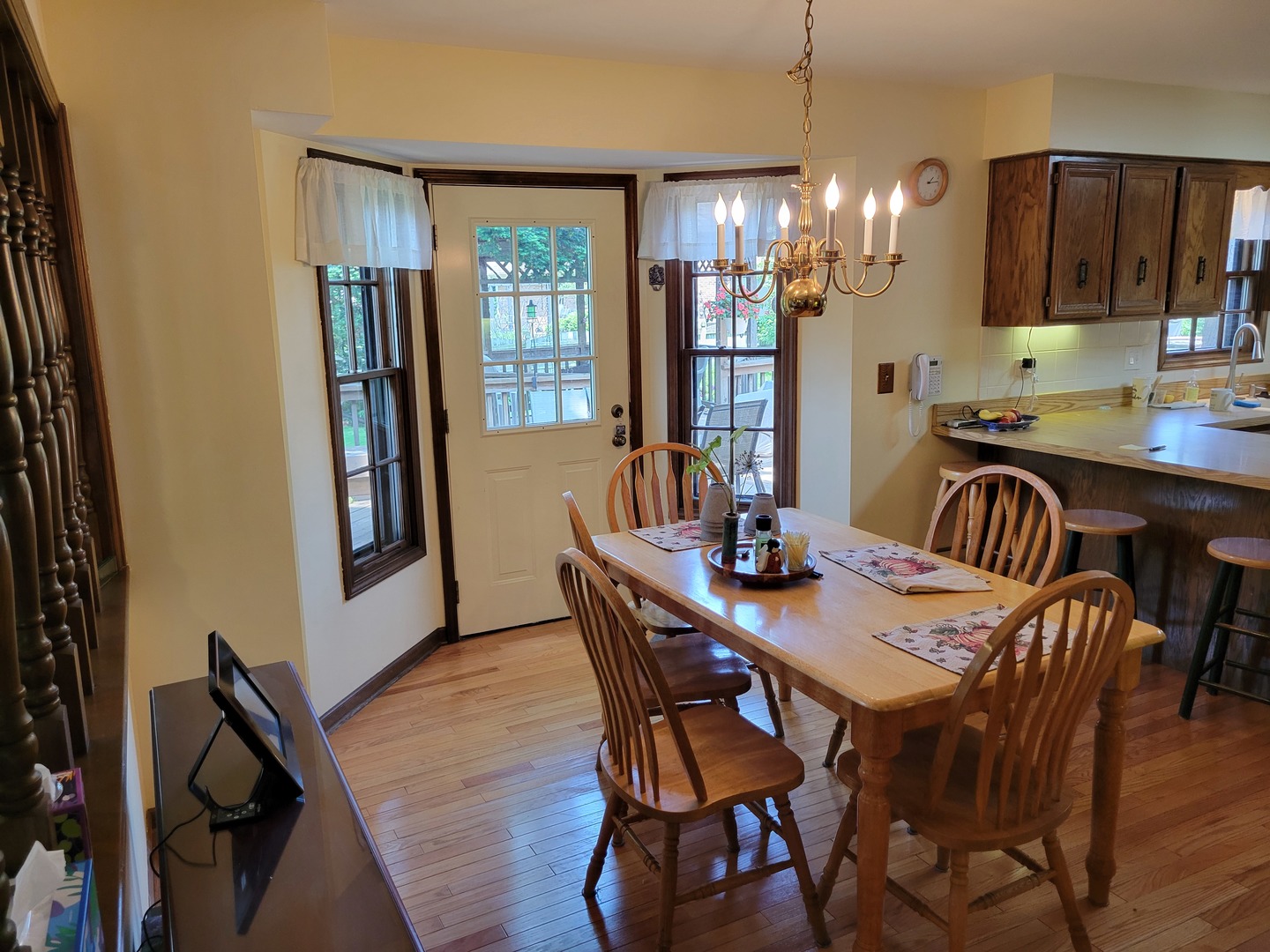 1263 Bainbridge Drive Naperville, IL 60563 - Photo 2 of 31 a view of a dining room with furniture window and outside view