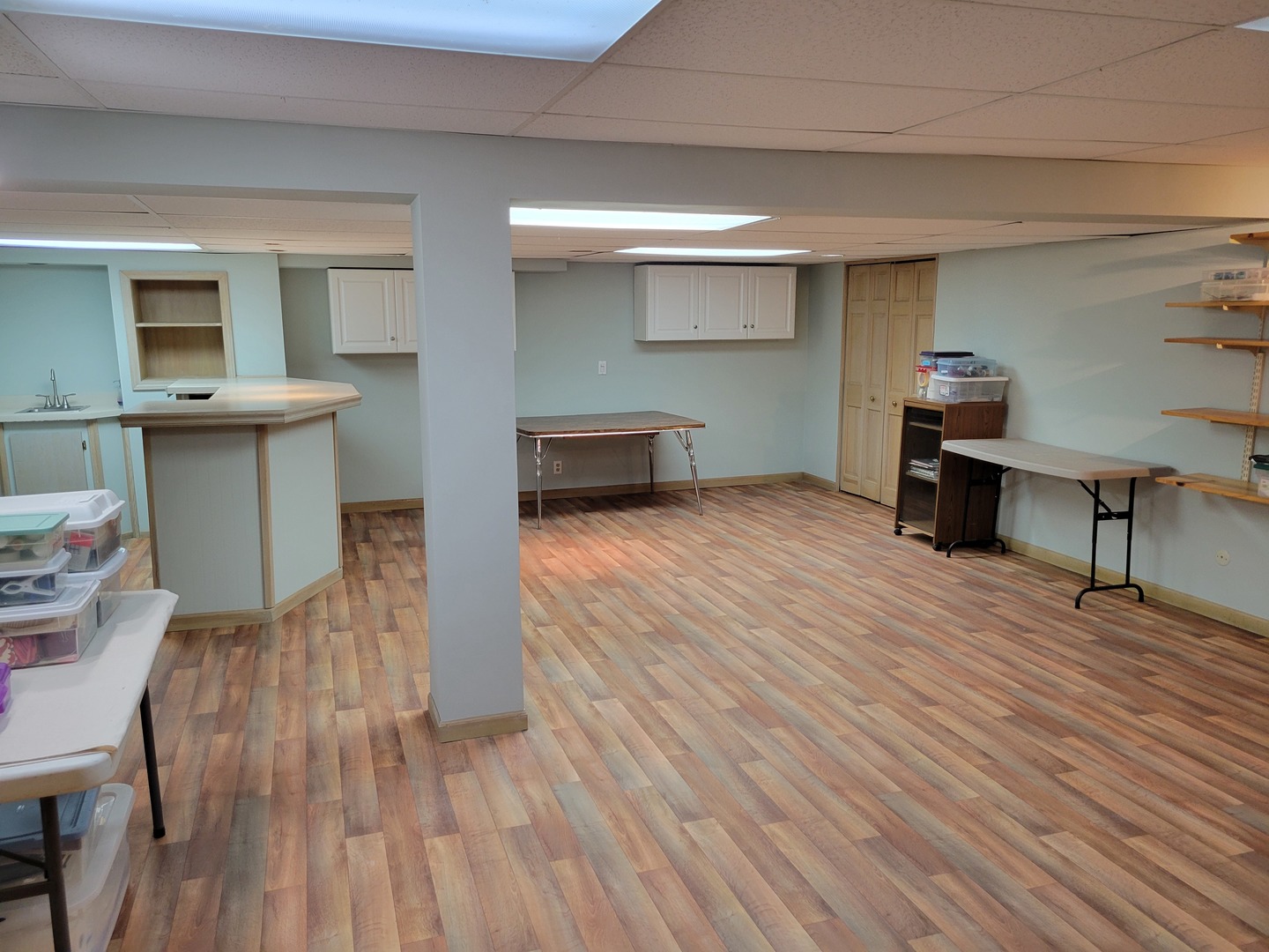 1263 Bainbridge Drive Naperville, IL 60563 - Photo 23 of 31 a view of a room with wooden floor and furniture