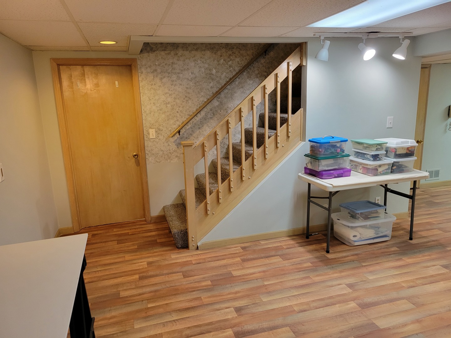 1263 Bainbridge Drive Naperville, IL 60563 - Photo 24 of 31 a room with stairs and wooden floor