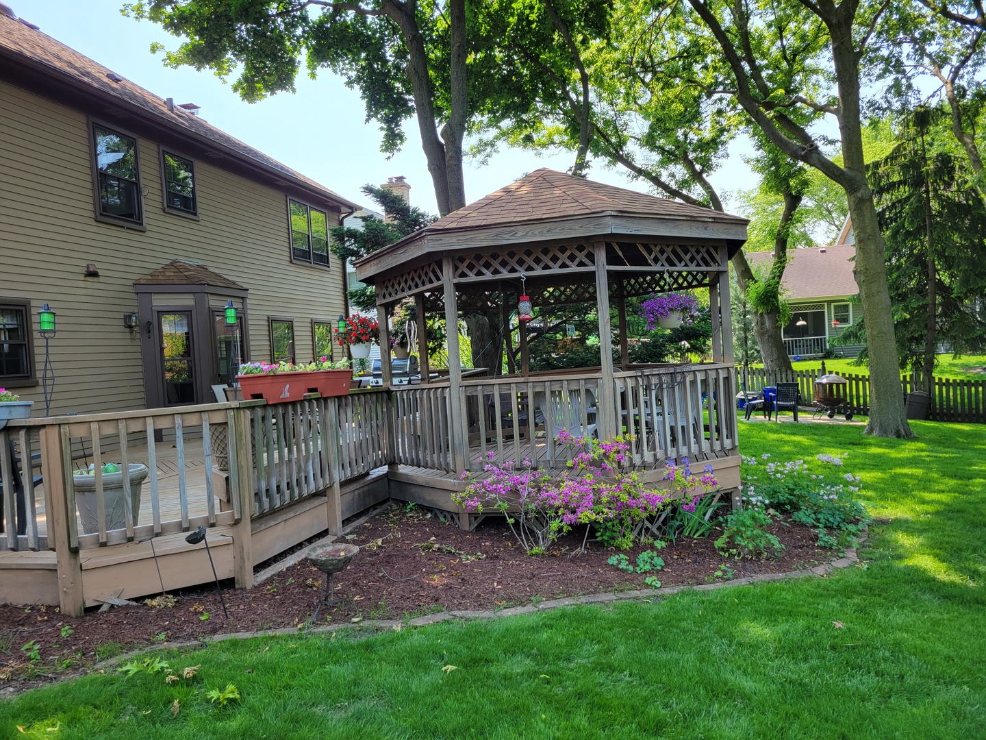 1263 Bainbridge Drive Naperville, IL 60563 - Photo 28 of 31 a view of a chair under an umbrella