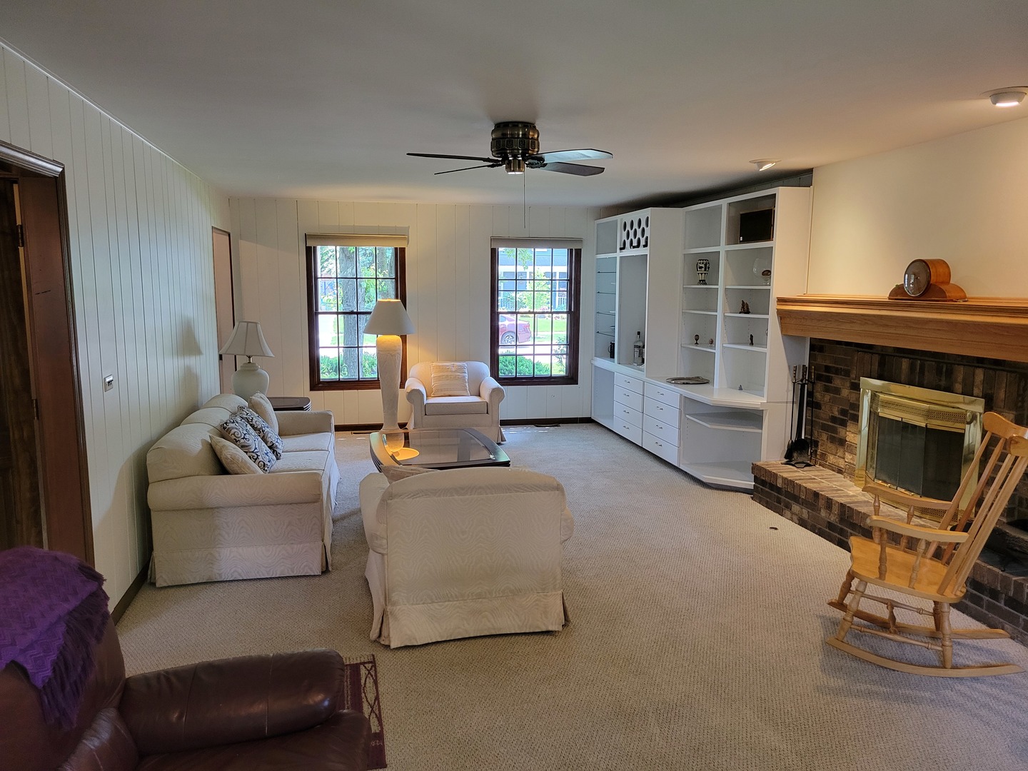 1263 Bainbridge Drive Naperville, IL 60563 - Photo 9 of 31 a living room with furniture and a fireplace