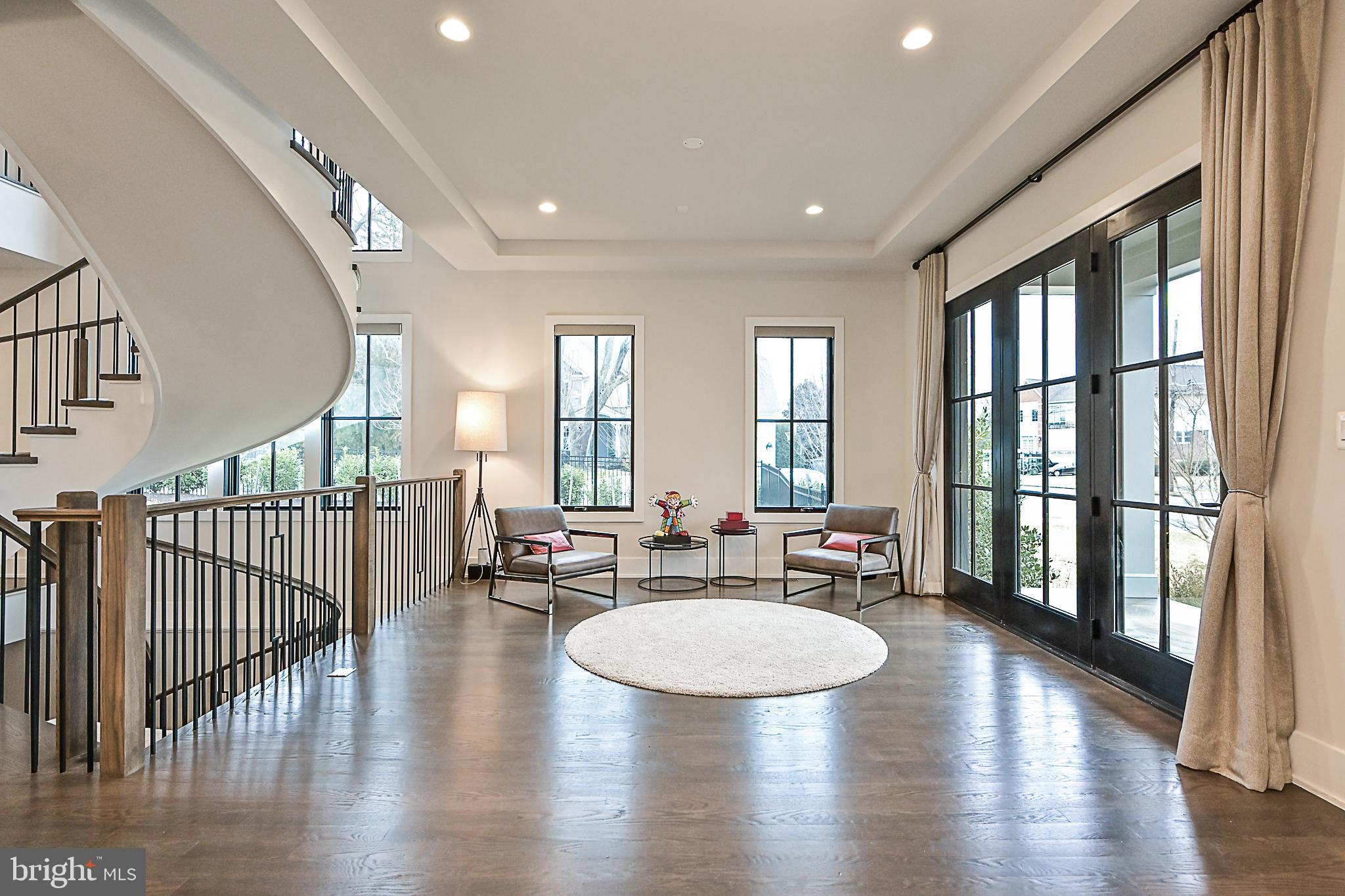 7126 Merrimac Drive McLean, VA 22101 - Photo 15 of 98 a living room with furniture and a table