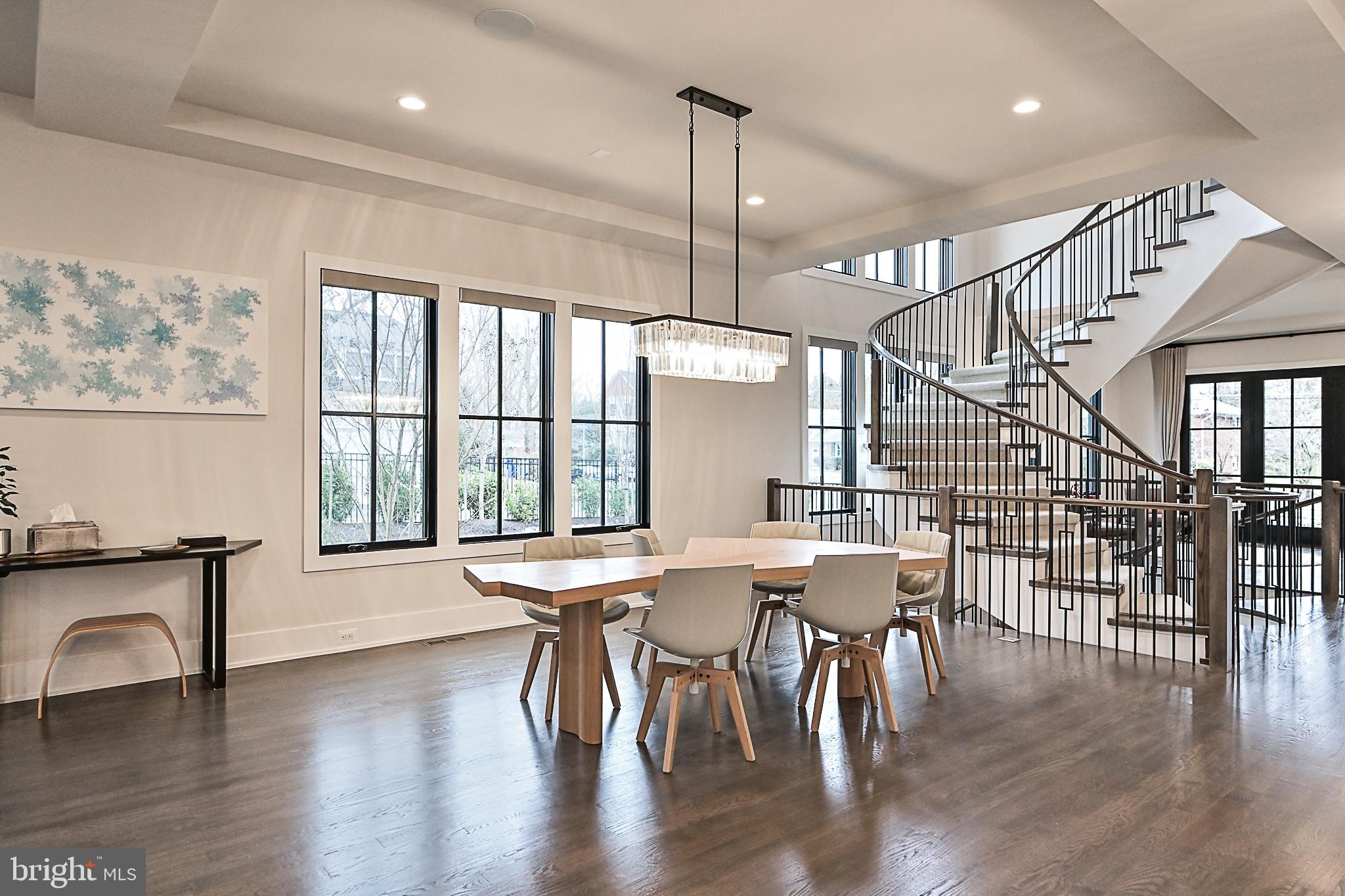 7126 Merrimac Drive McLean, VA 22101 - Photo 23 of 98 a dining room with furniture window entryway and wooden floor