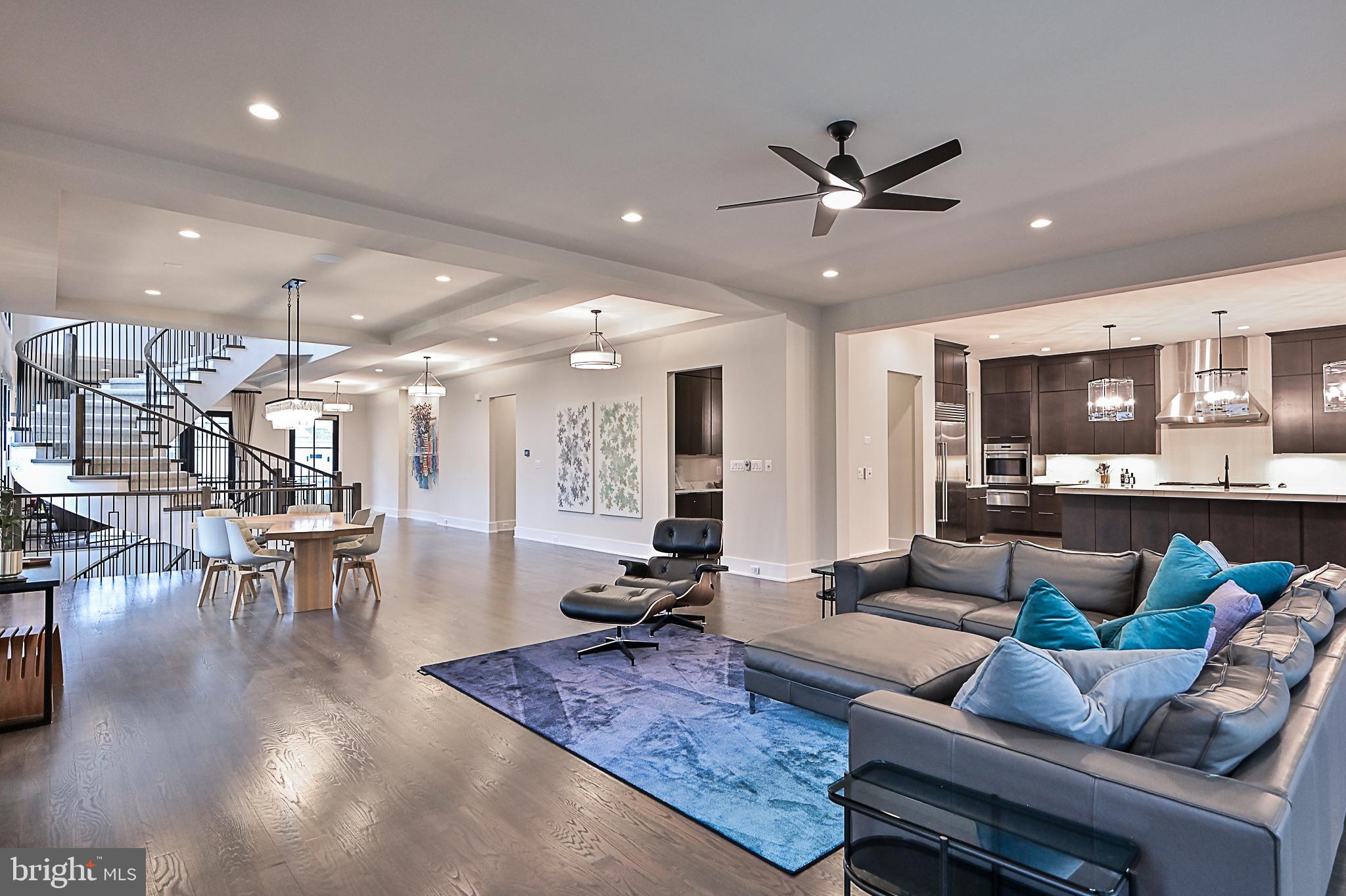 7126 Merrimac Drive McLean, VA 22101 - Photo 30 of 98 a living room with furniture and kitchen view