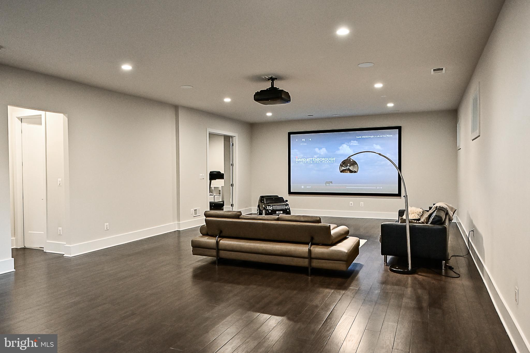 7126 Merrimac Drive McLean, VA 22101 - Photo 87 of 98 a living room with furniture and a flat screen tv