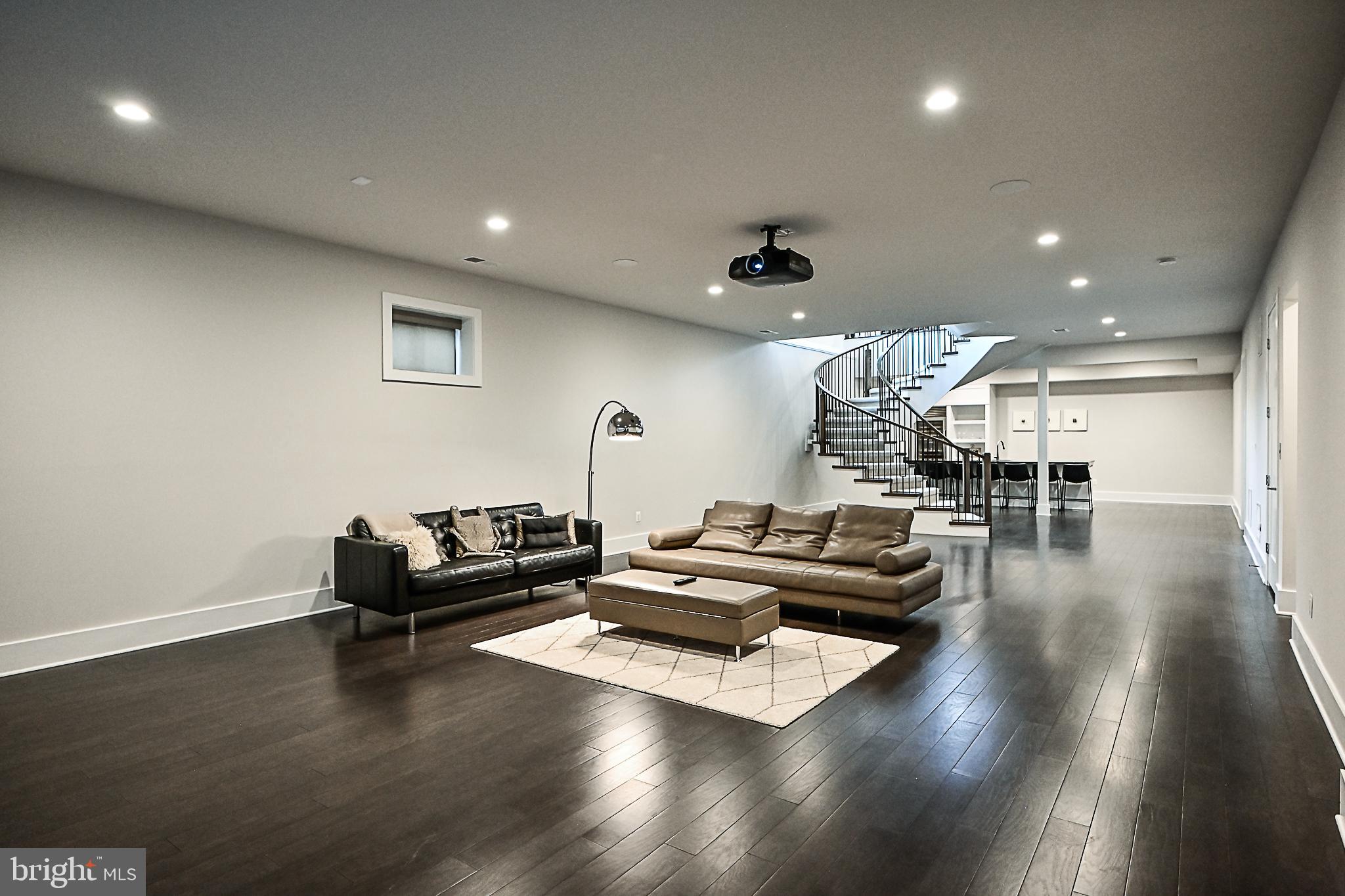 7126 Merrimac Drive McLean, VA 22101 - Photo 91 of 98 a living room with furniture and a wooden floor