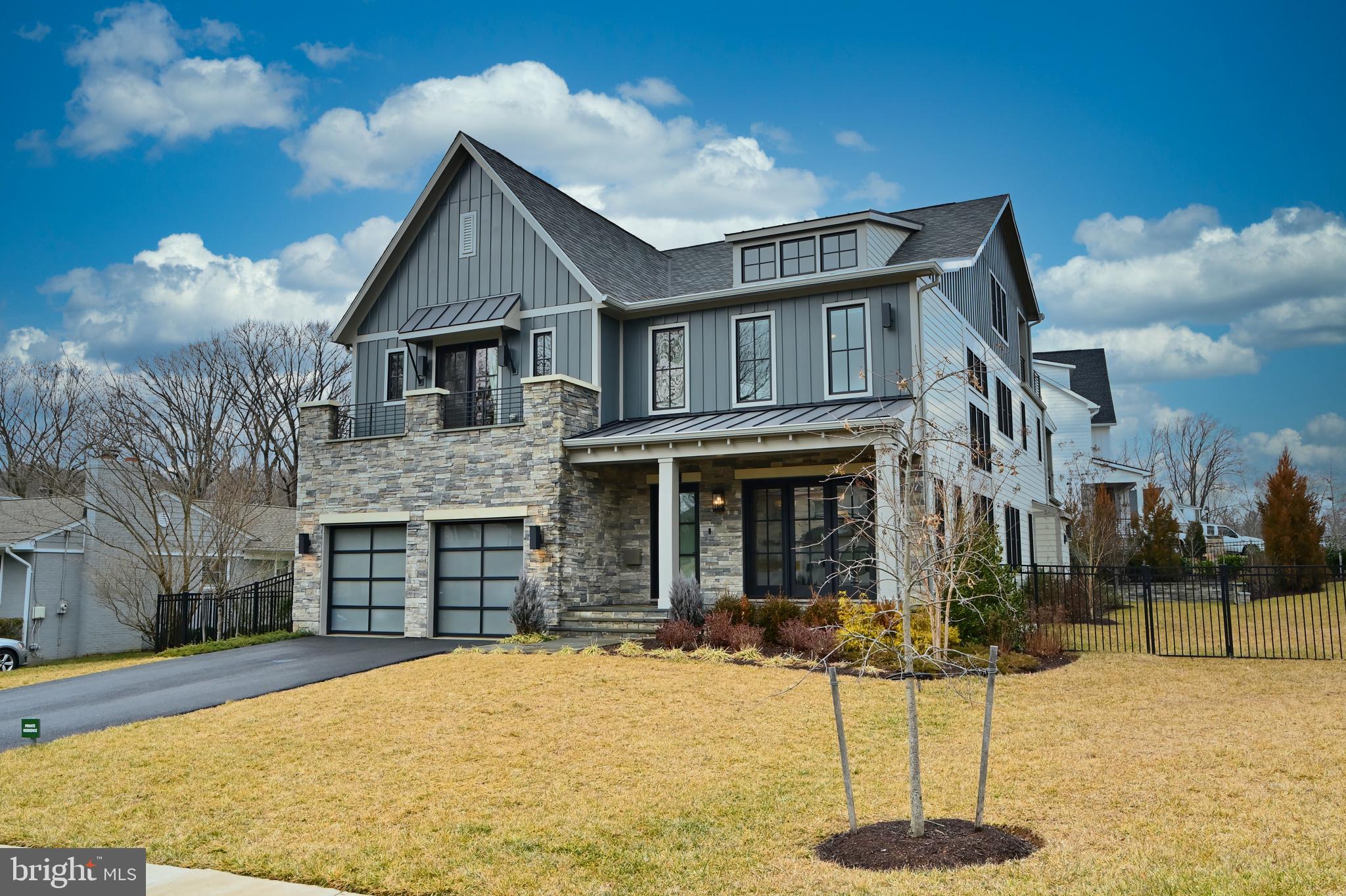7126 Merrimac Drive McLean, VA 22101 - Photo 98 of 98 a front view of a house with a yard
