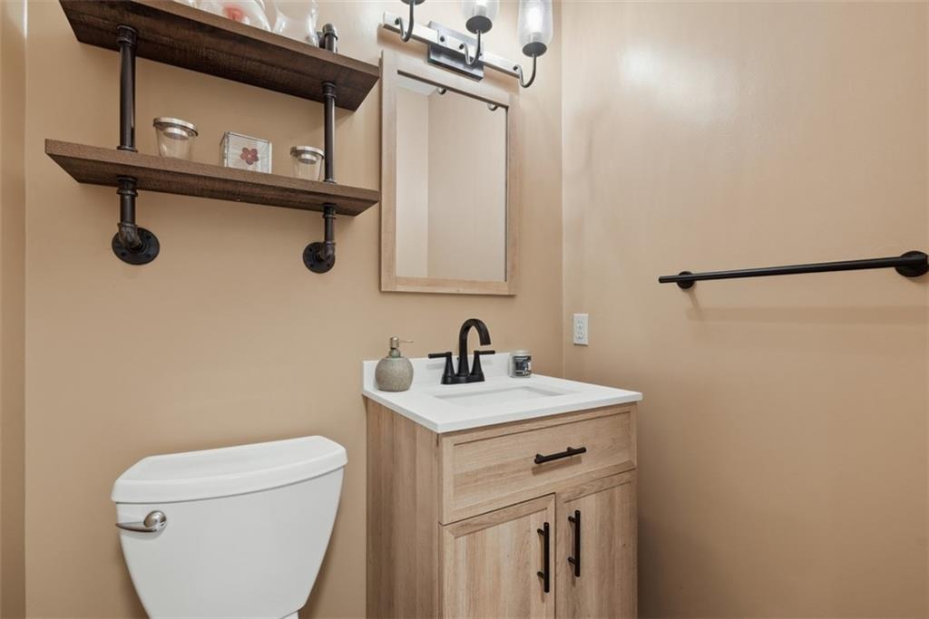 111 Greenhill Road Pittsburgh, PA 15237 - Photo 19 of 40 a bathroom with a sink vanity mirror and toilet