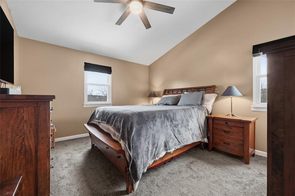 111 Greenhill Road Pittsburgh, PA 15237 - Photo 20 of 40 a bedroom with a bed and a flat tv screen on dresser