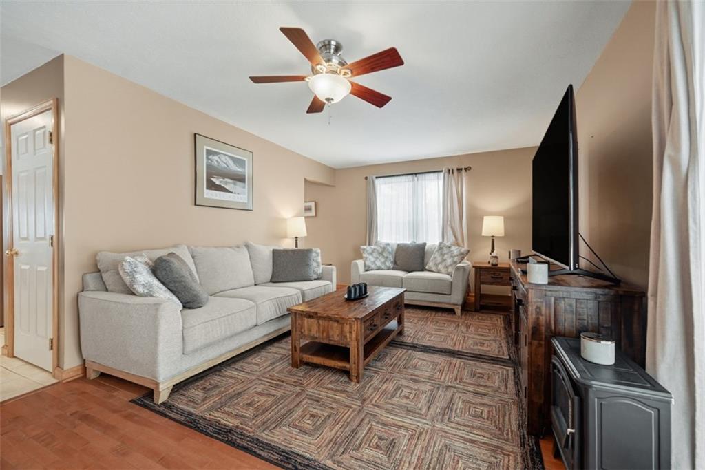 111 Greenhill Road Pittsburgh, PA 15237 - Photo 8 of 40 a living room with furniture ceiling fan and a rug