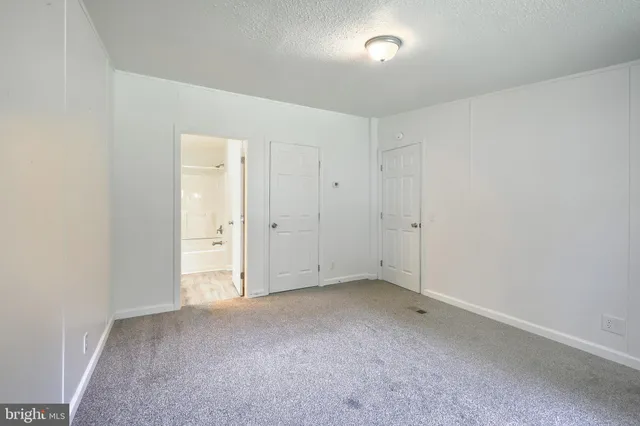an empty room with an entryway