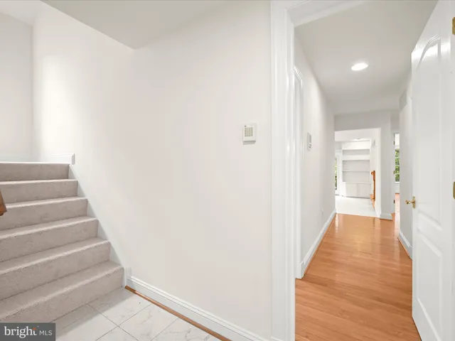a bathroom with a toilet a sink and bathtub