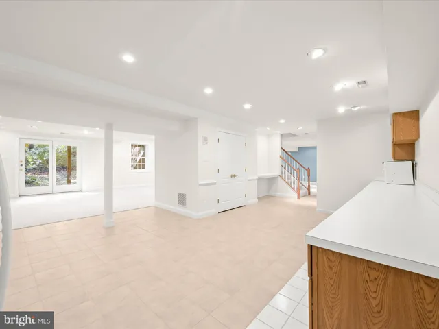 a view of a backyard with large trees