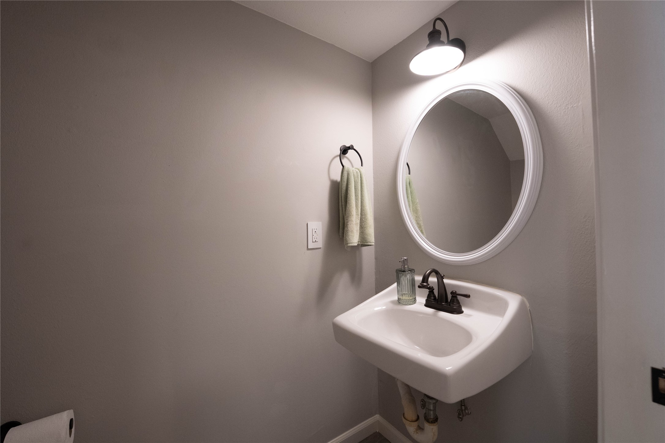 7447 Brompton Street, Unit 7447 Houston, TX 77025 - Photo 17 of 27 Half powder room.