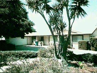 565 East Not Slo Road Santa Maria, CA 93455 - Photo 1 of 1 a front view of a house with yard and green space