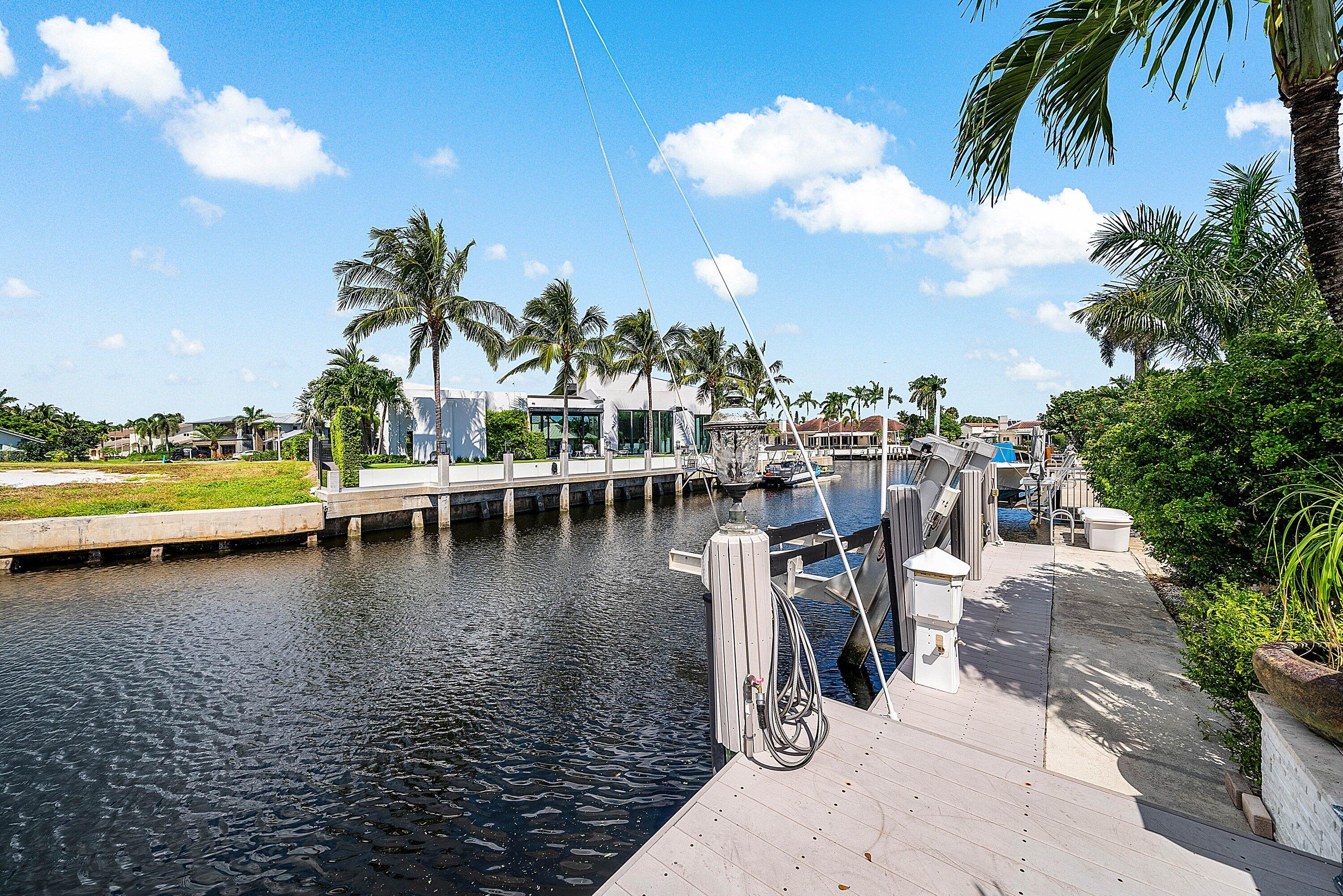7425 Northeast Bay Cove Court Boca Raton, FL 33487 - Photo 32 of 86 Composite Dock w/ 20,000 LB Boat Lift