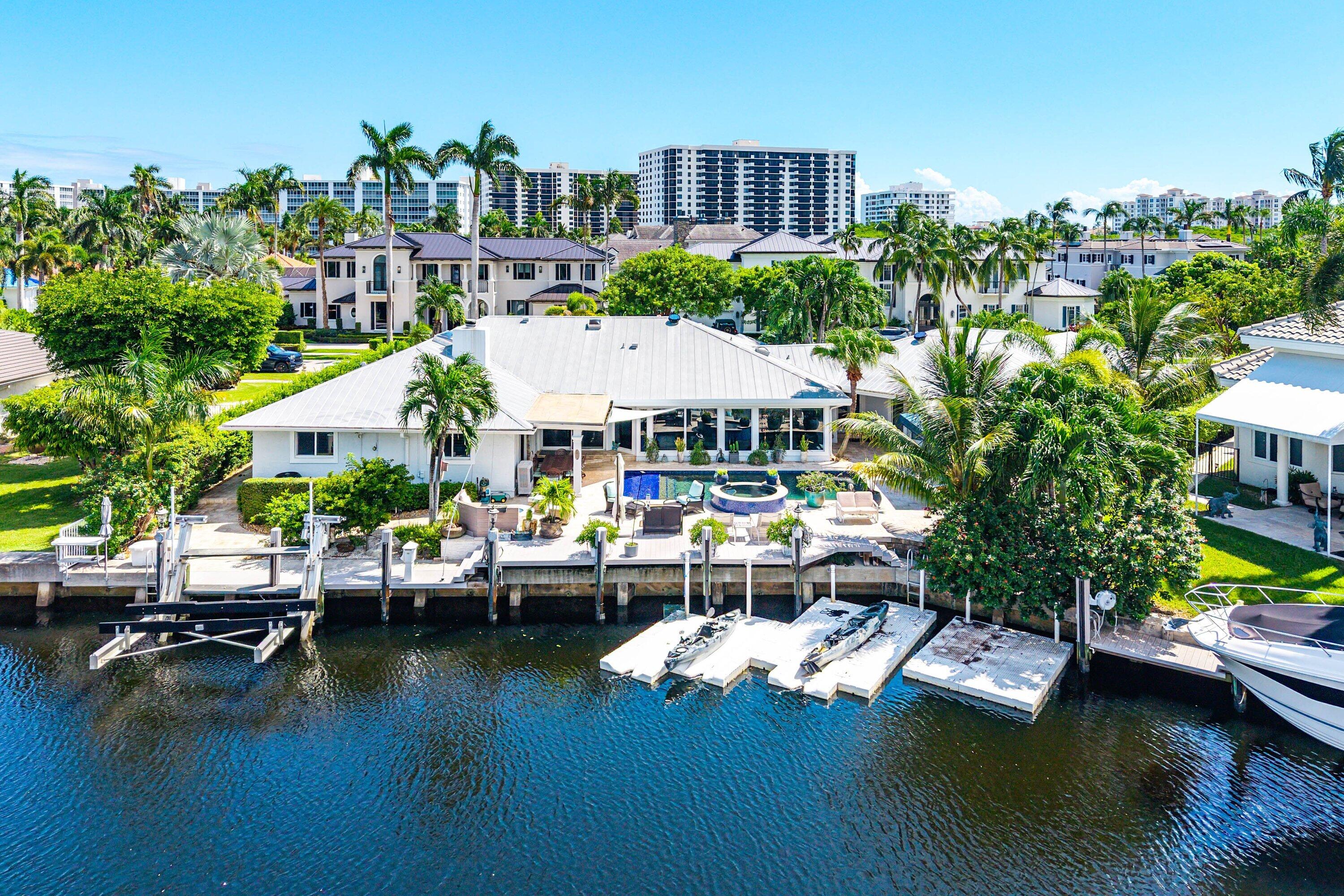 7425 Northeast Bay Cove Court Boca Raton, FL 33487 - Photo 34 of 86 East Aerial w/ Dock/Canal
