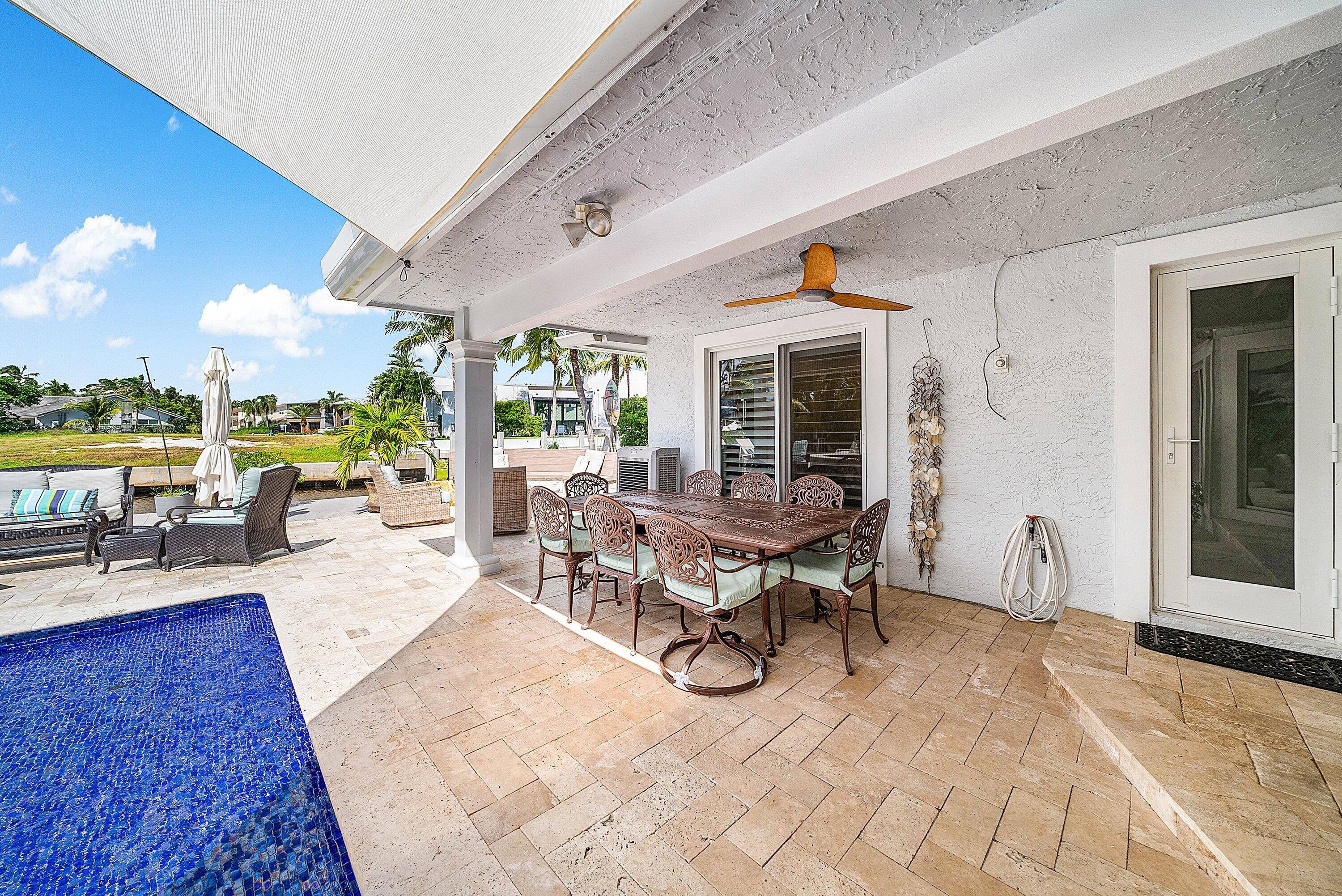 7425 Northeast Bay Cove Court Boca Raton, FL 33487 - Photo 68 of 86 Covered Patio Area