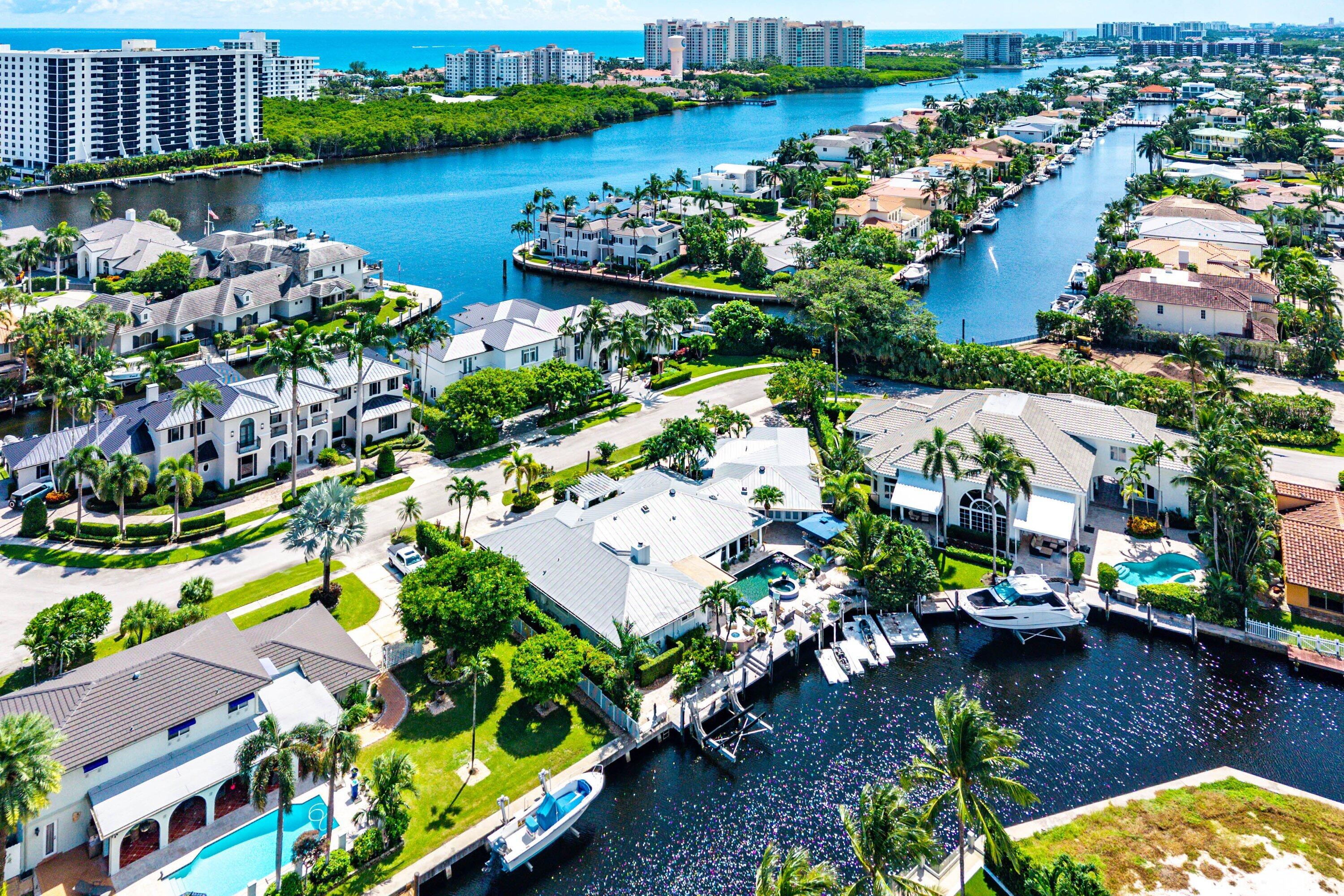 7425 Northeast Bay Cove Court Boca Raton, FL 33487 - Photo 78 of 86 an aerial view of lake residential house with outdoor space