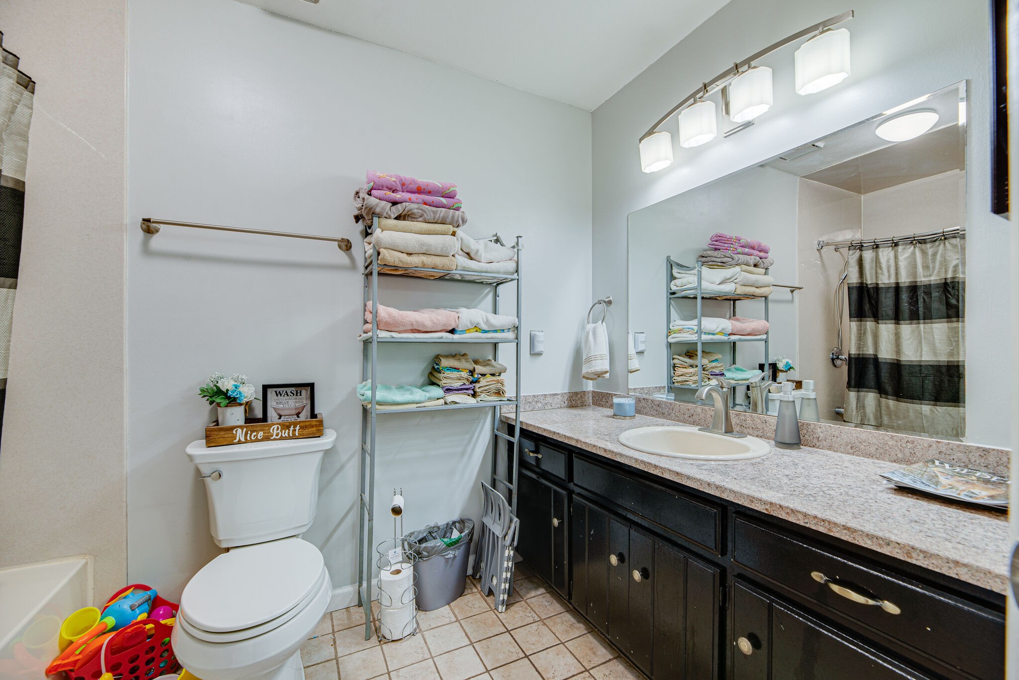 5140 East Calgary Murfreesboro, TN 37129 - Photo 13 of 30 a bathroom with a sink a toilet and a shower