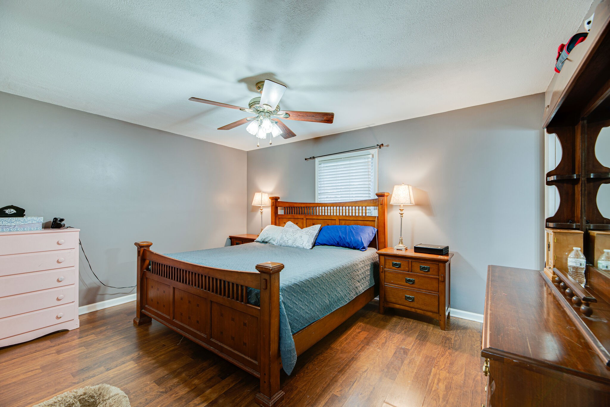 5140 East Calgary Murfreesboro, TN 37129 - Photo 16 of 30 a bedroom with a bed and a chandelier