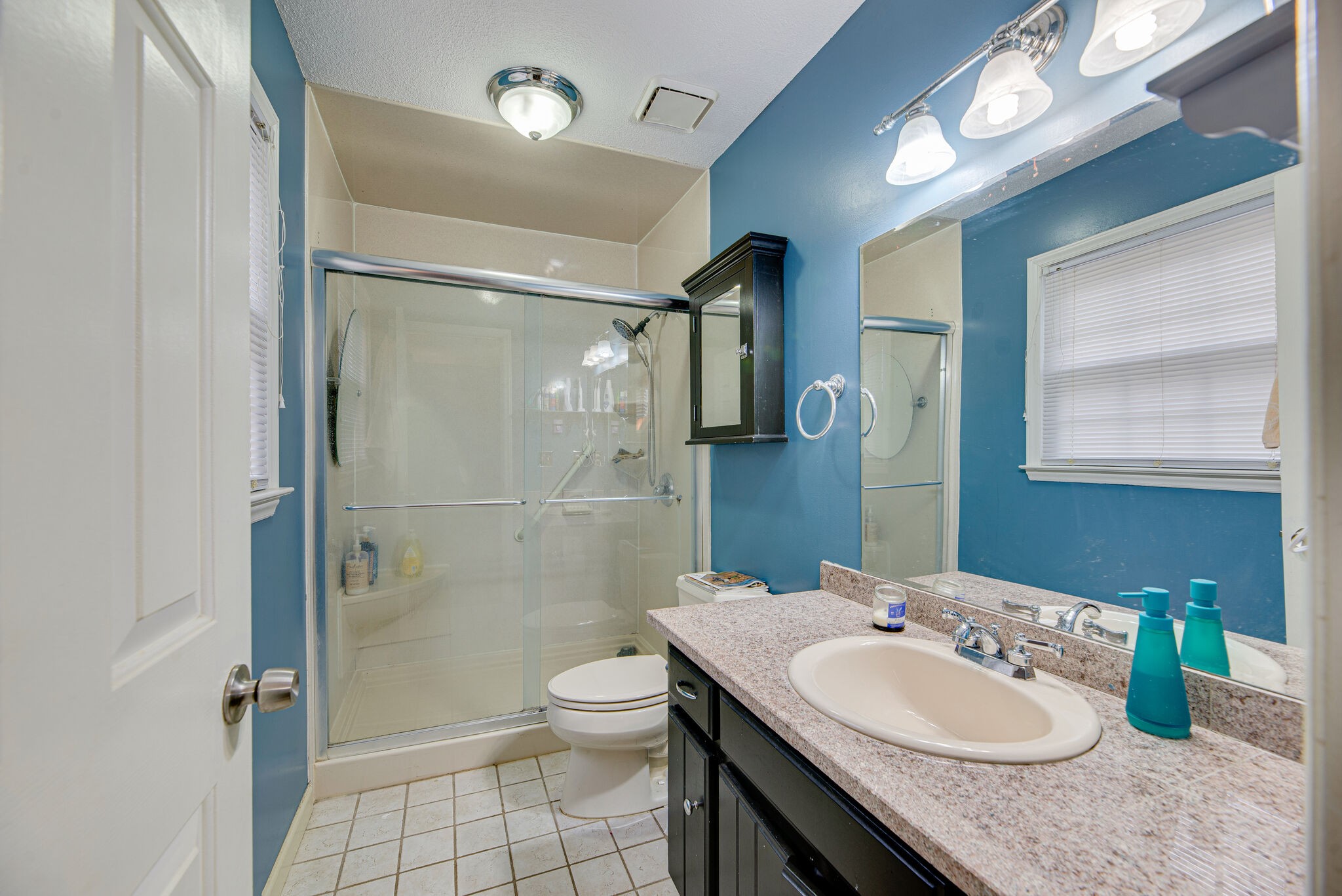 5140 East Calgary Murfreesboro, TN 37129 - Photo 18 of 30 a bathroom with a granite countertop sink toilet and shower