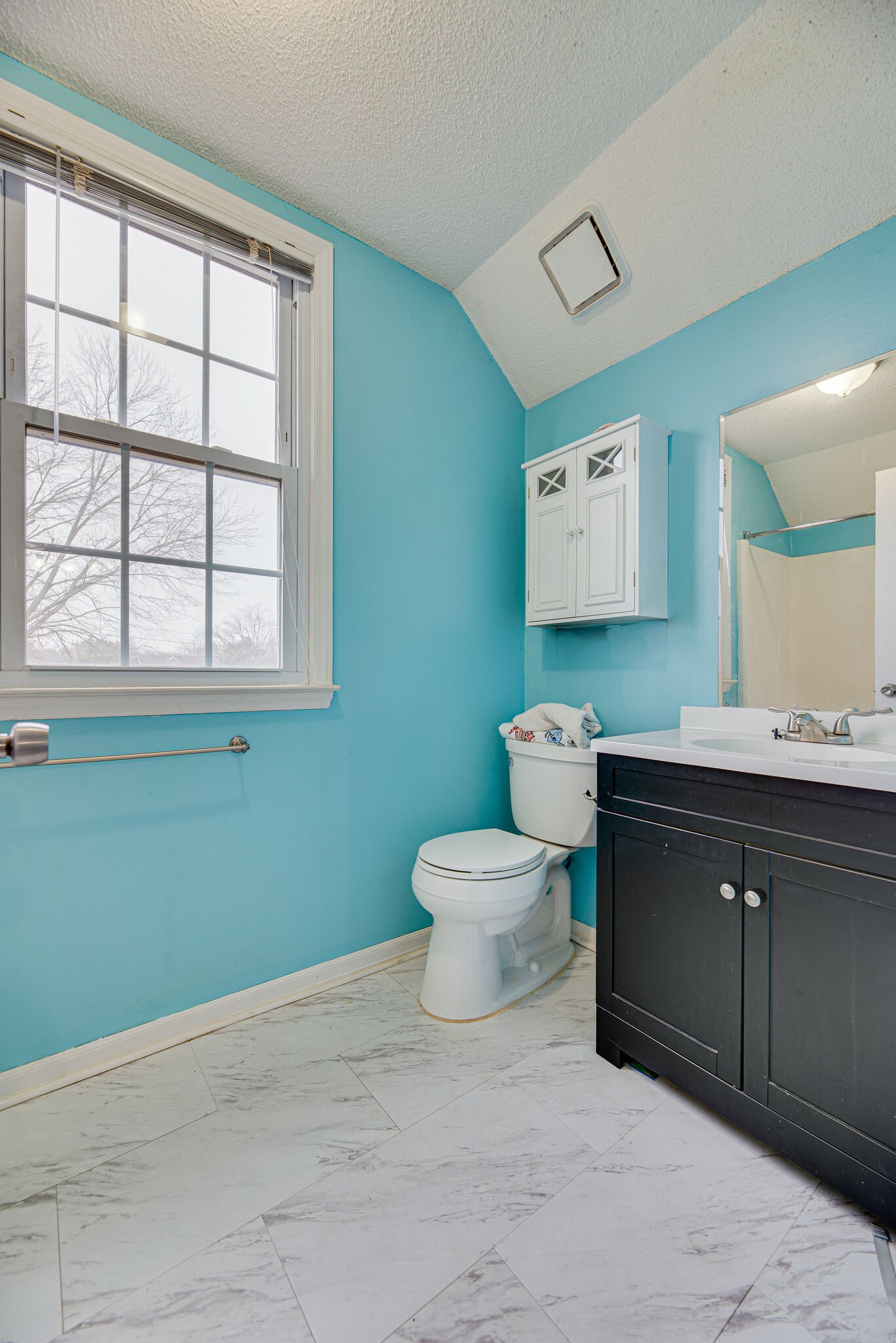 5140 East Calgary Murfreesboro, TN 37129 - Photo 21 of 30 a bathroom with a toilet sink and mirror