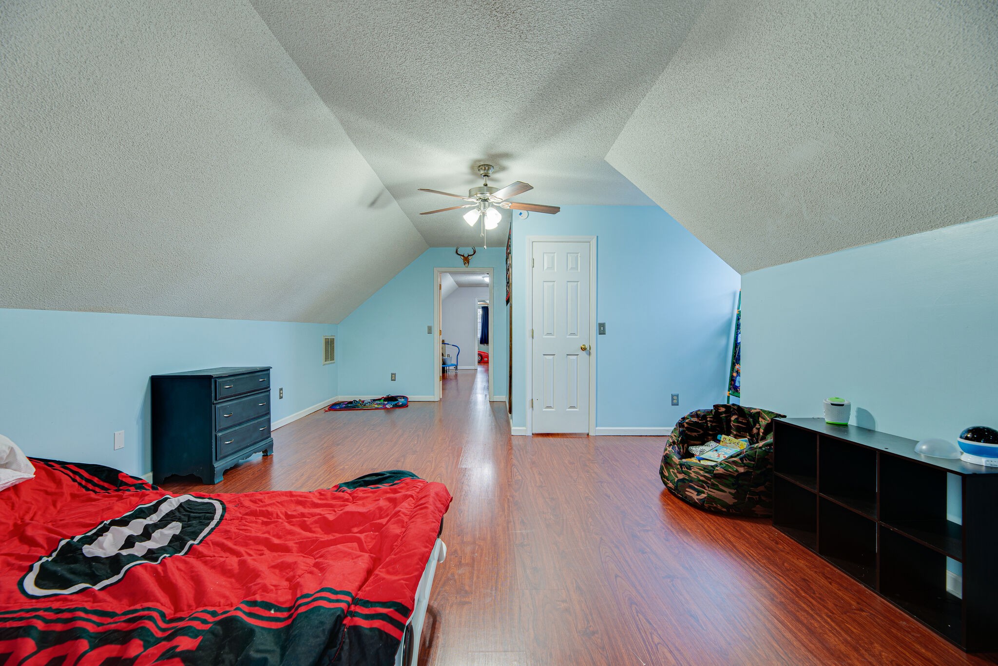 5140 East Calgary Murfreesboro, TN 37129 - Photo 22 of 30 a bed room with a bed and a chandelier