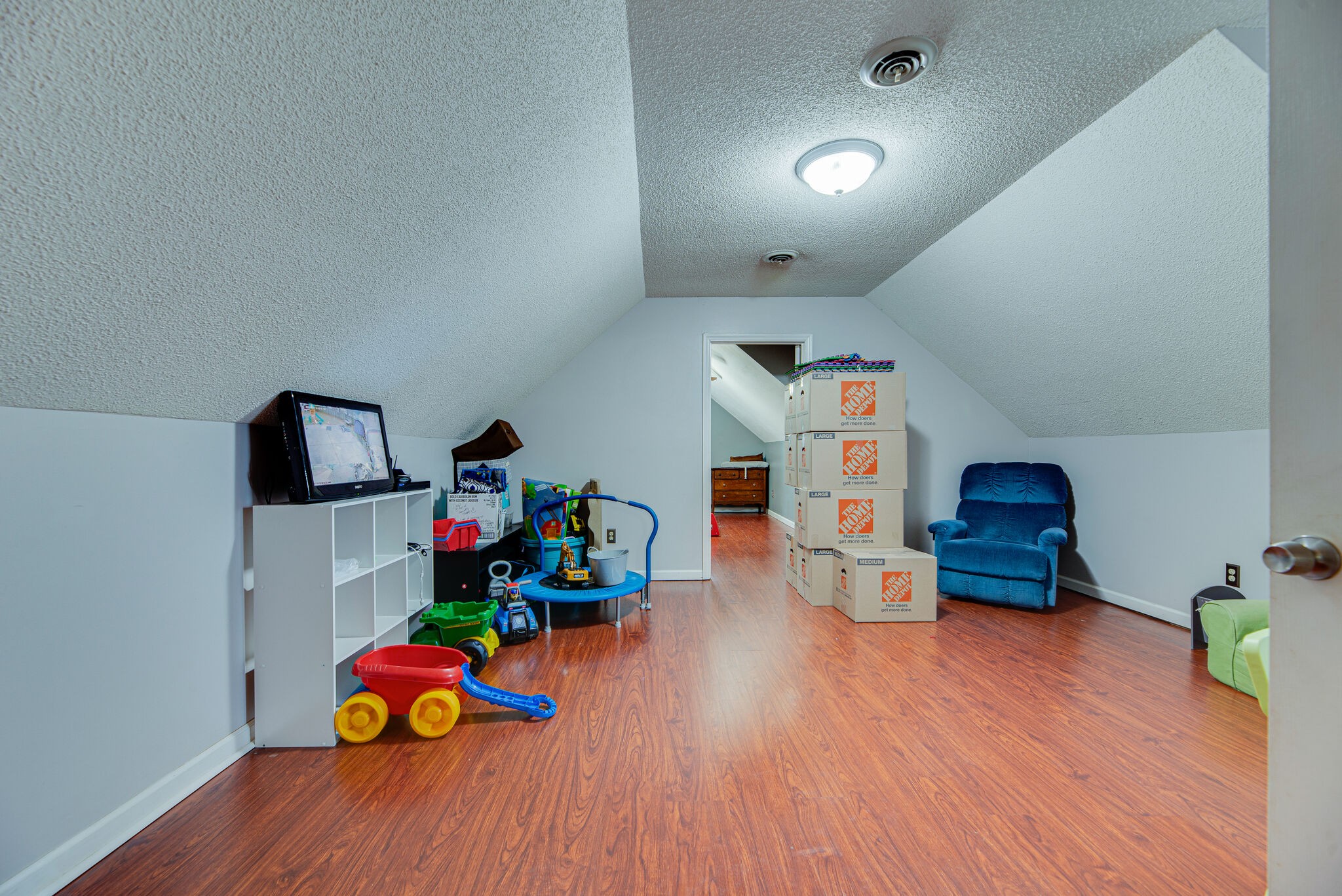 5140 East Calgary Murfreesboro, TN 37129 - Photo 23 of 30 a room with furniture and wooden floor