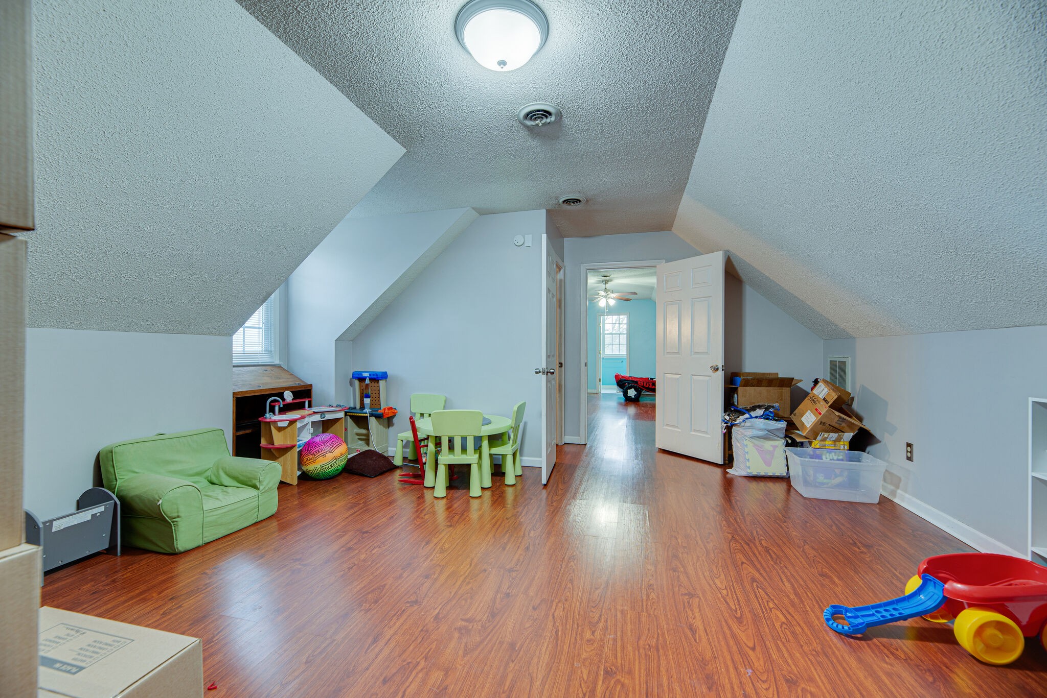 5140 East Calgary Murfreesboro, TN 37129 - Photo 24 of 30 a view of a play room with furniture and wooden floor