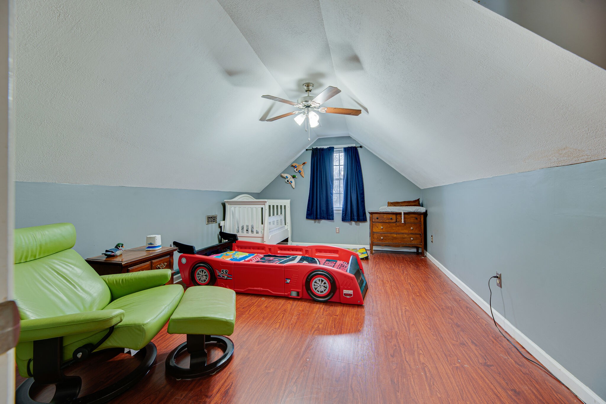 5140 East Calgary Murfreesboro, TN 37129 - Photo 25 of 30 a room with furniture and a wooden floor