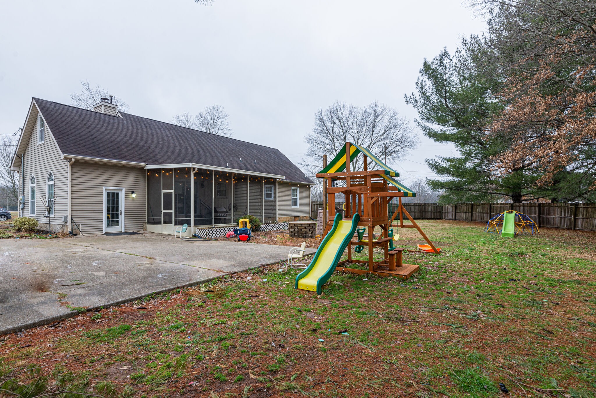 5140 East Calgary Murfreesboro, TN 37129 - Photo 29 of 30 a view of a house with a backyard and a slide