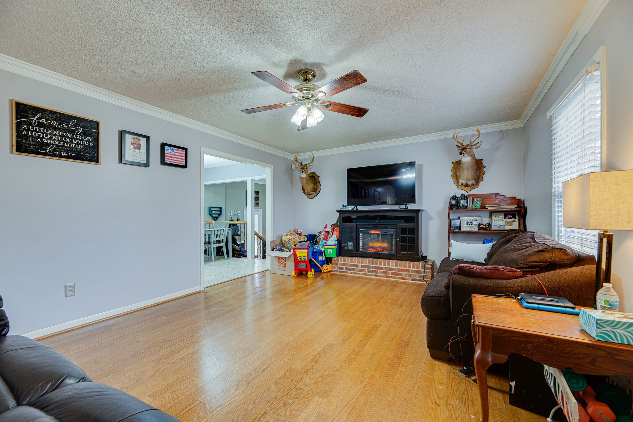 5140 East Calgary Murfreesboro, TN 37129 - Photo 7 of 30 a living room with furniture and a fireplace