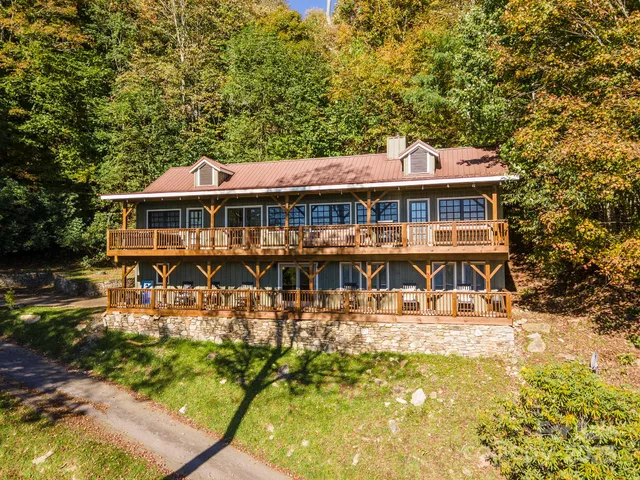 a view of a house with swimming pool
