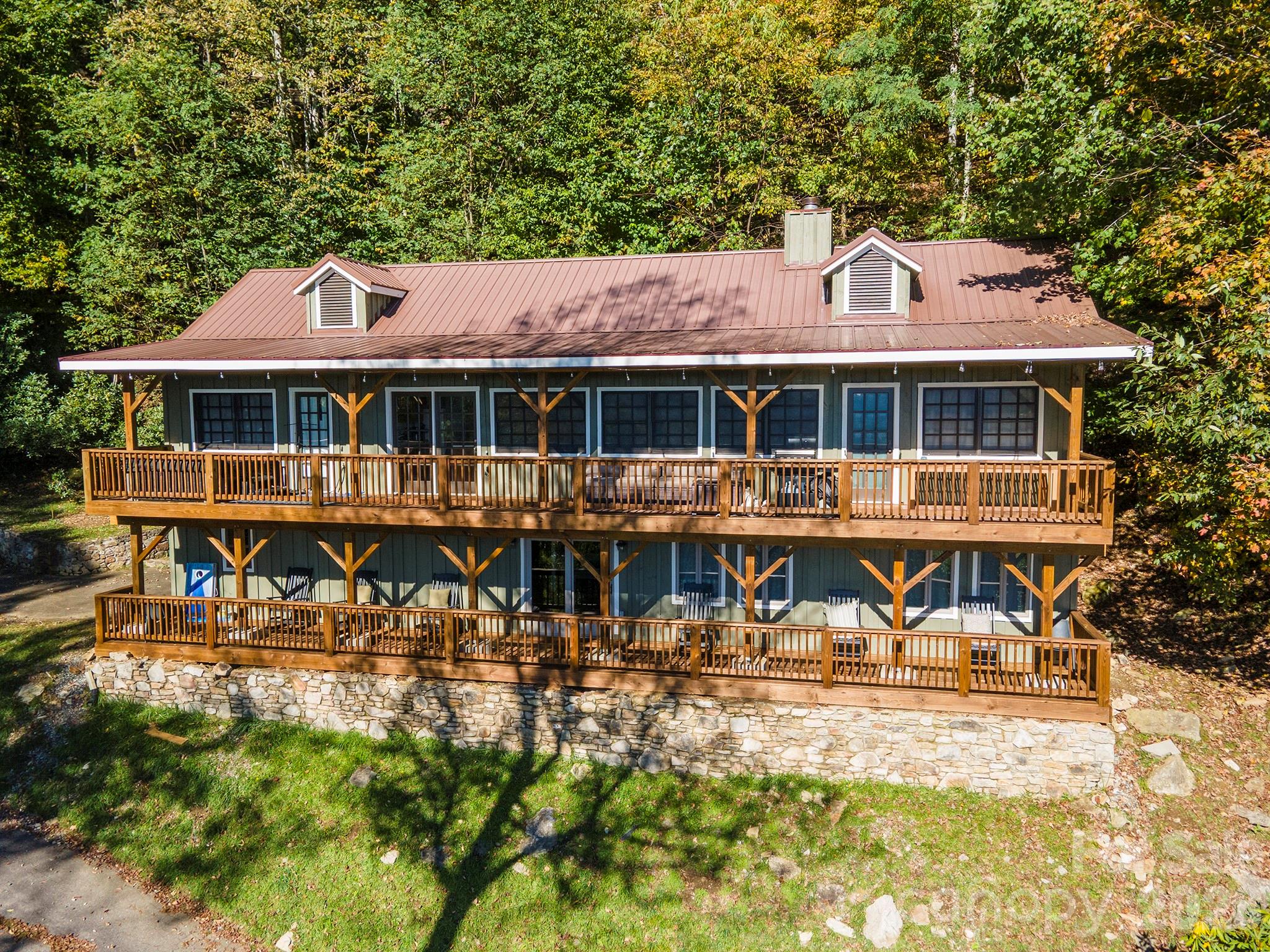 322 Goldenleaf Road Mars Hill, NC 28754 - Photo 15 of 47 a front view of a house with swimming pool
