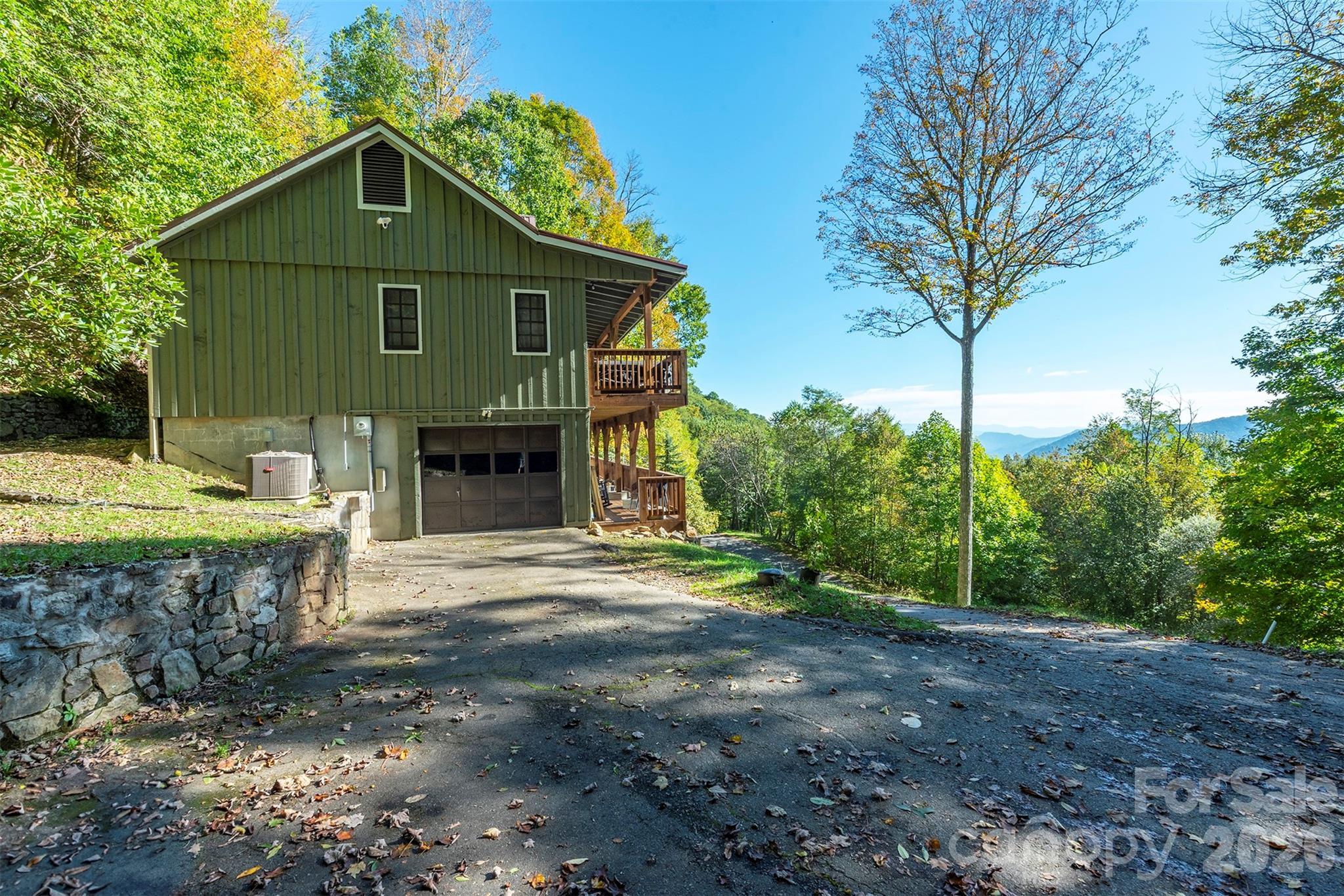 322 Goldenleaf Road Mars Hill, NC 28754 - Photo 18 of 47 a front view of a house with a garden