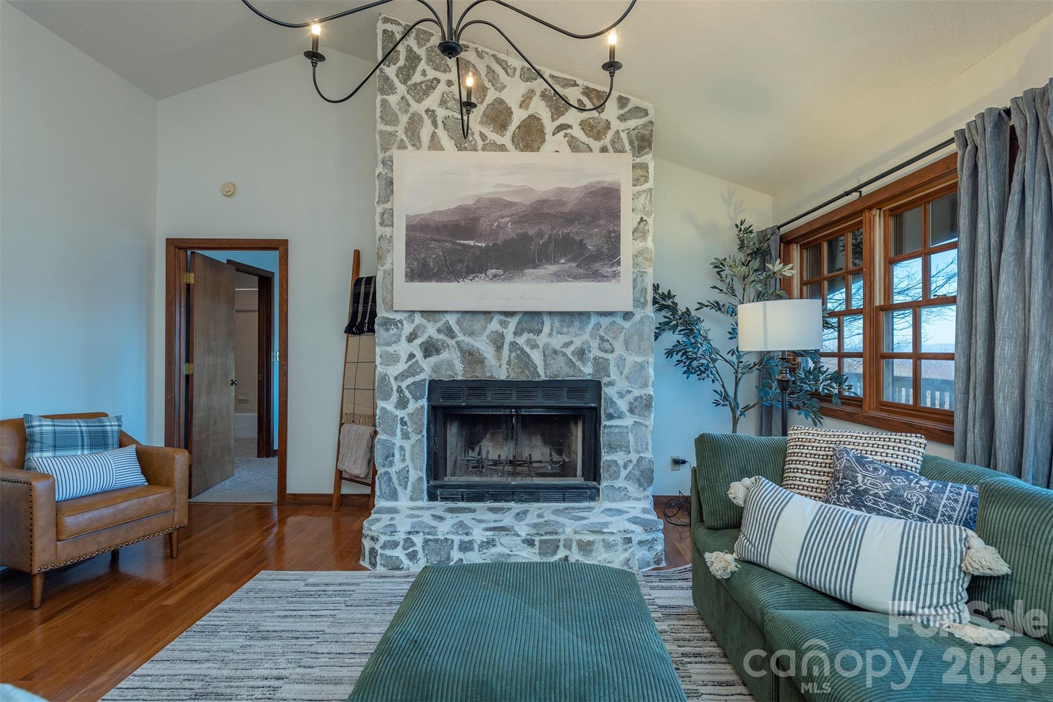 322 Goldenleaf Road Mars Hill, NC 28754 - Photo 23 of 47 a living room with furniture and a fireplace