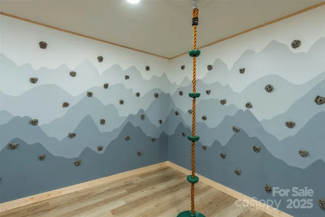 a bathroom with a shower and a sink