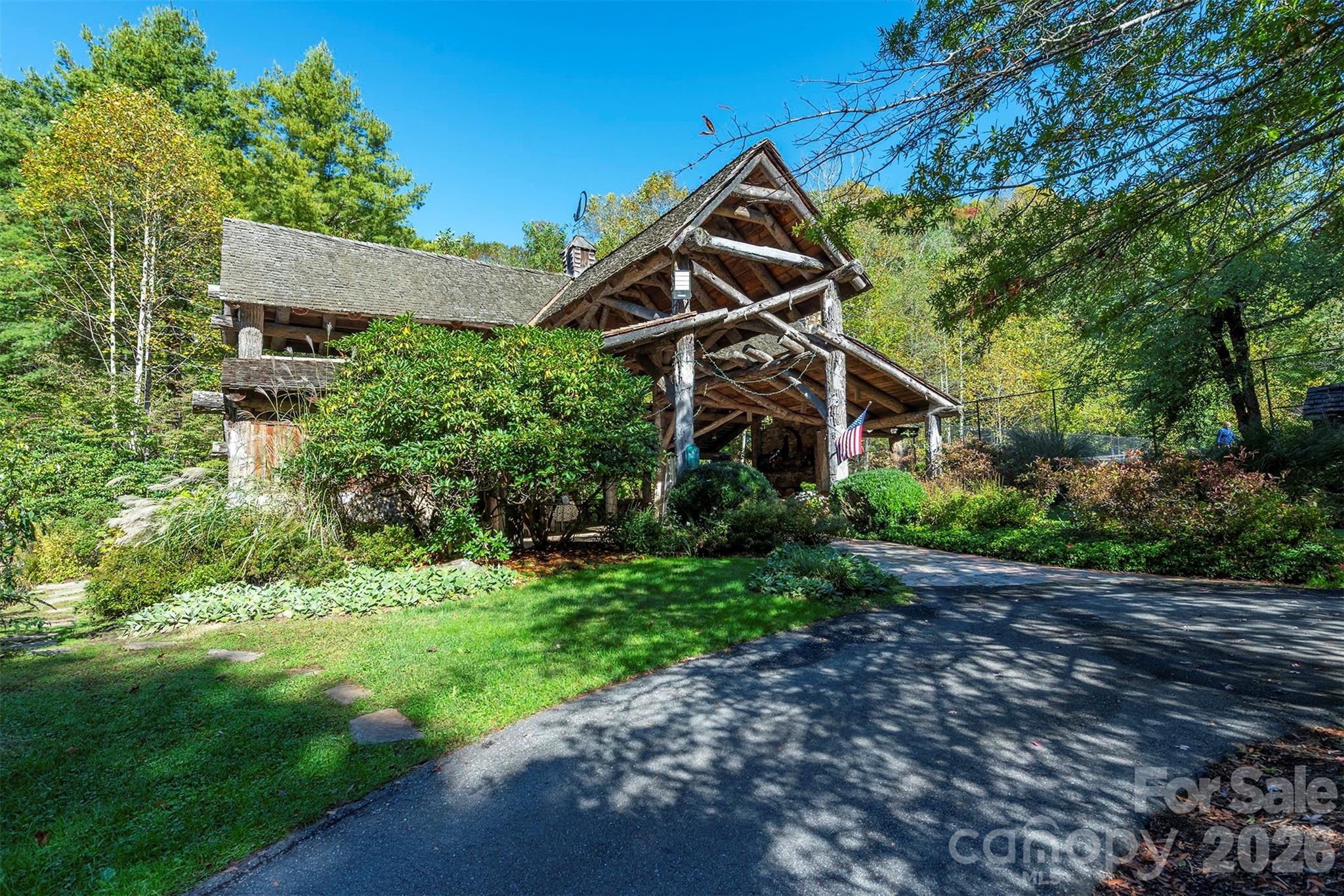 322 Goldenleaf Road Mars Hill, NC 28754 - Photo 44 of 47 a view of a house with a yard