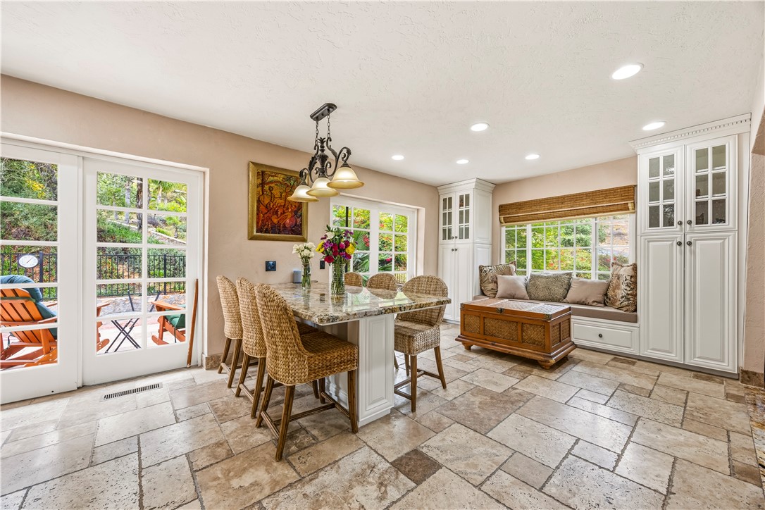 1485 Vía Ladera Fallbrook, CA 92028 - Photo 18 of 43 a view of a dining room with furniture window and outside view