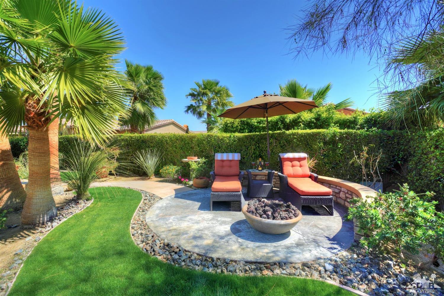 5 Via Santa Velera Rancho Mirage, CA 92270 - Photo 14 of 90 a view of a chairs and table in the garden