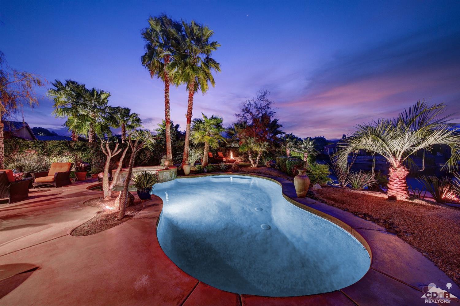 5 Via Santa Velera Rancho Mirage, CA 92270 - Photo 15 of 90 a view of a swimming pool with a patio
