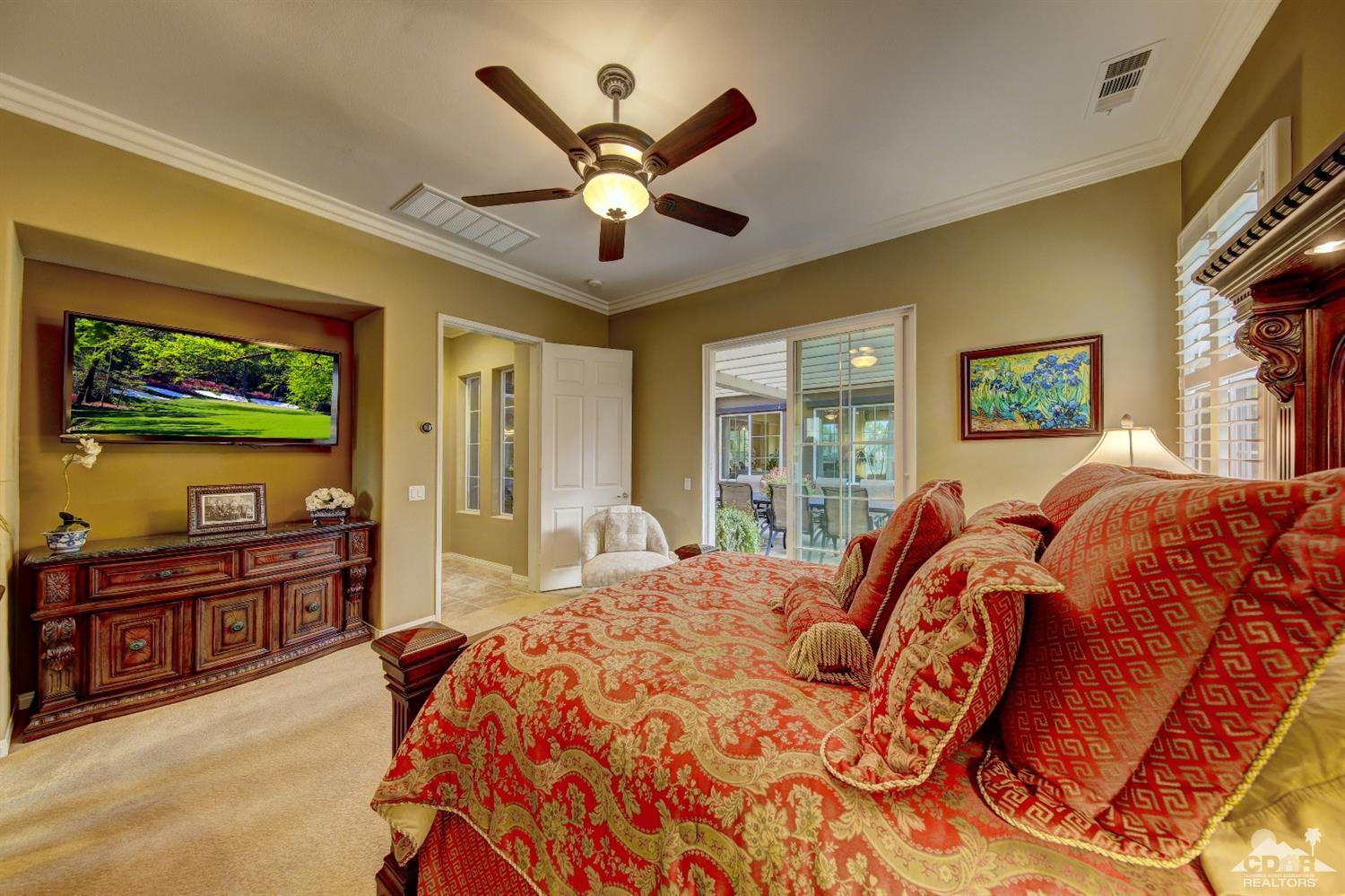 5 Via Santa Velera Rancho Mirage, CA 92270 - Photo 27 of 90 a bedroom with a bed and a flat screen tv