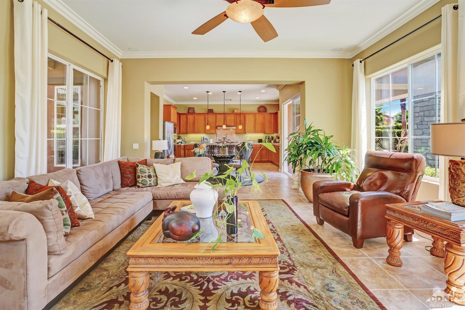 5 Via Santa Velera Rancho Mirage, CA 92270 - Photo 35 of 90 a living room with furniture and a large window