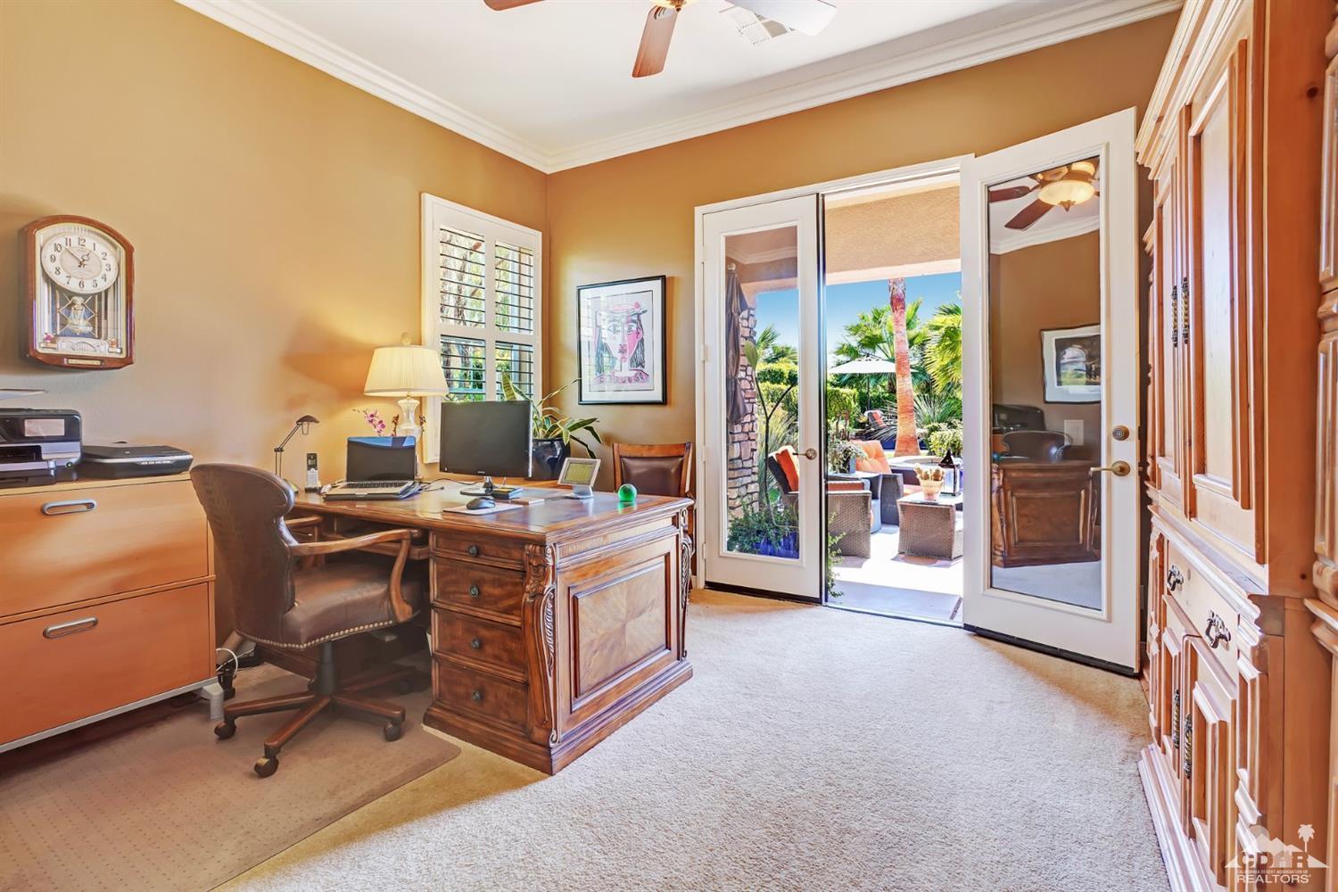 5 Via Santa Velera Rancho Mirage, CA 92270 - Photo 45 of 90 a view of a workspace with a window and couch