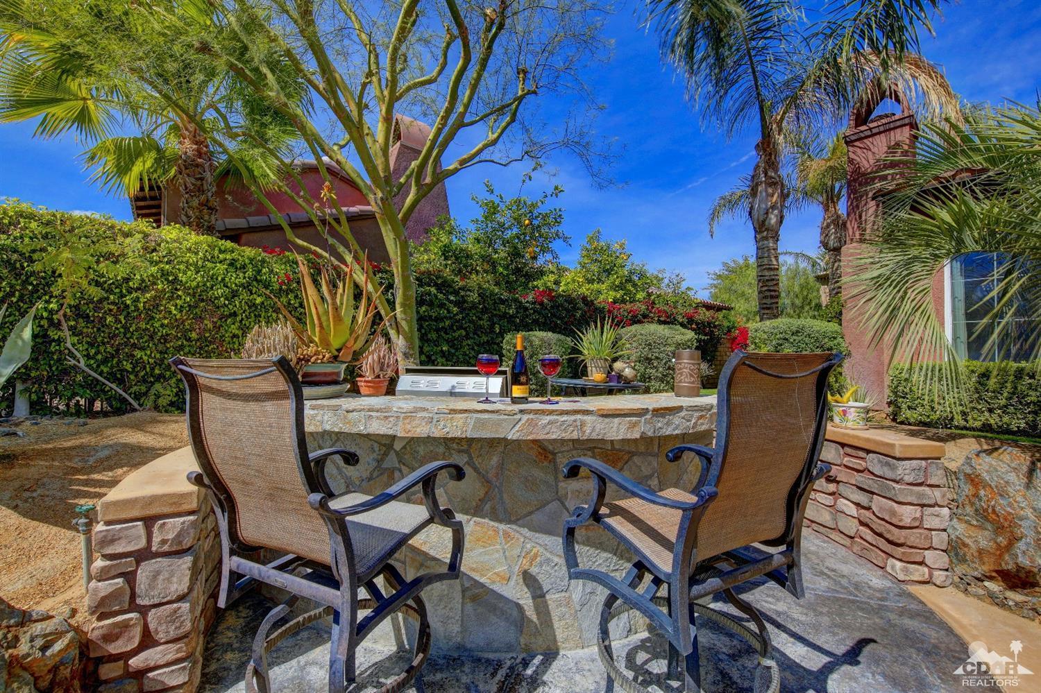 5 Via Santa Velera Rancho Mirage, CA 92270 - Photo 59 of 90 a view of a chairs and table in patio
